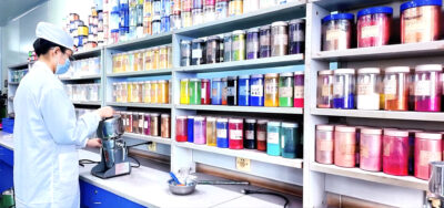 Professional technicians operate various equipment