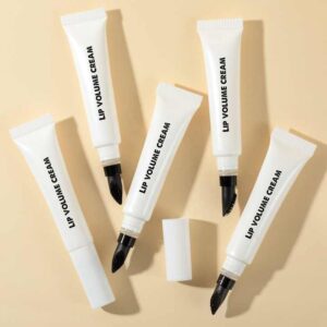 Custom Lip Treatment Balm tube with unique buff applicator.