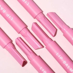 Custom Plumping Lip Gloss stick in pink shade.