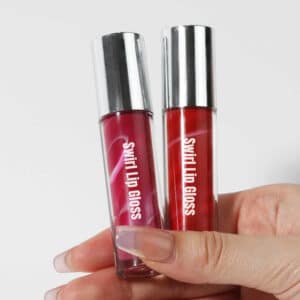 Close-up of custom marble swirled texture in lip gloss tube