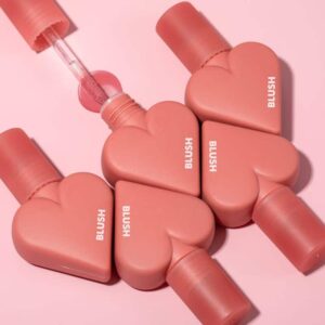 A vibrant, vegan private label heart shaped liquid blush from manufacturer KNY Cosmetics, showcasing the unique packaging perfect for B2B branding.